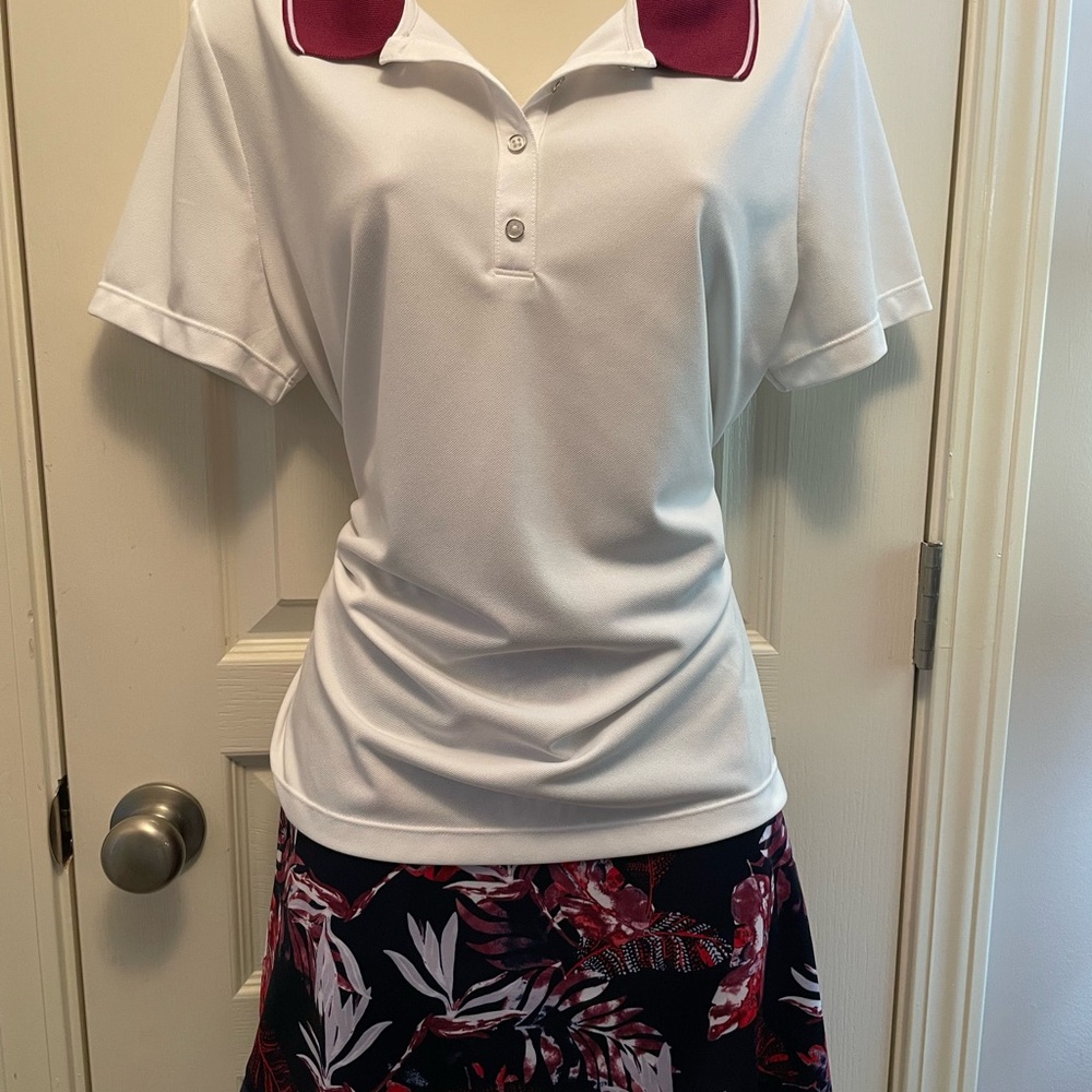 Coral Bay Women's White Polo Top with Burgundy Collar and floral skort Golf Set